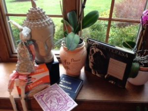A bunny on matzo, Buddha, A Course in Miracles, The Santa Cruz Haggadah and Mother Teresa.